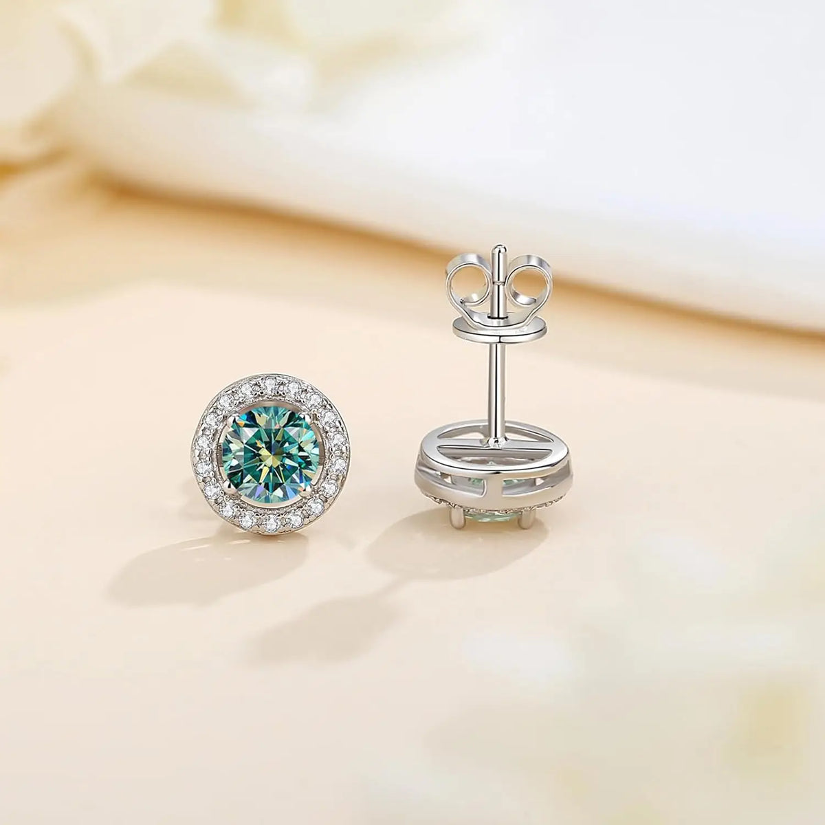 Stud earrings with teal moissanite for women