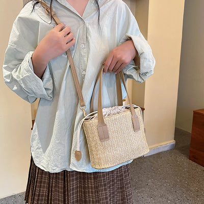 Bucket bag woven from straw for women