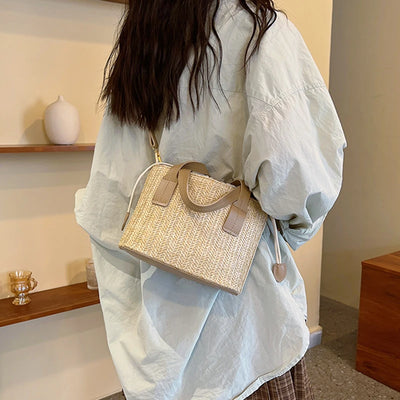 Bucket bag woven from straw for women