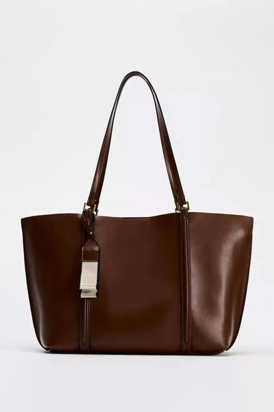 Leather tote bag with minimalist design for women