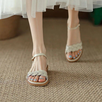 Roman-style flat sandals with braided detail for women