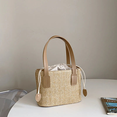 Bucket bag woven from straw for women