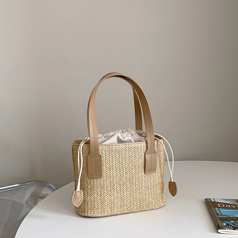 Bucket bag woven from straw for women