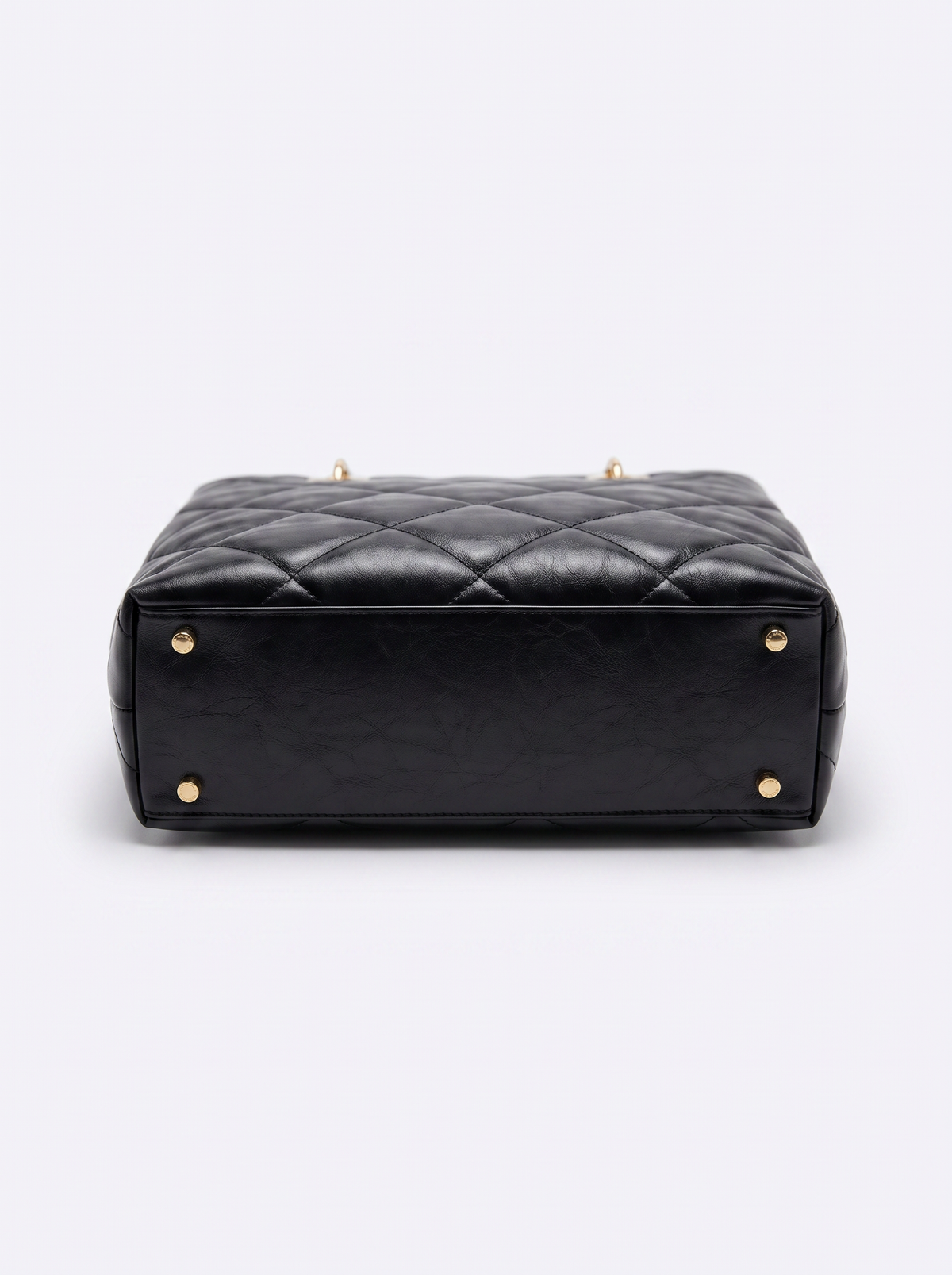 Leather tote bag with quilted stitching for women