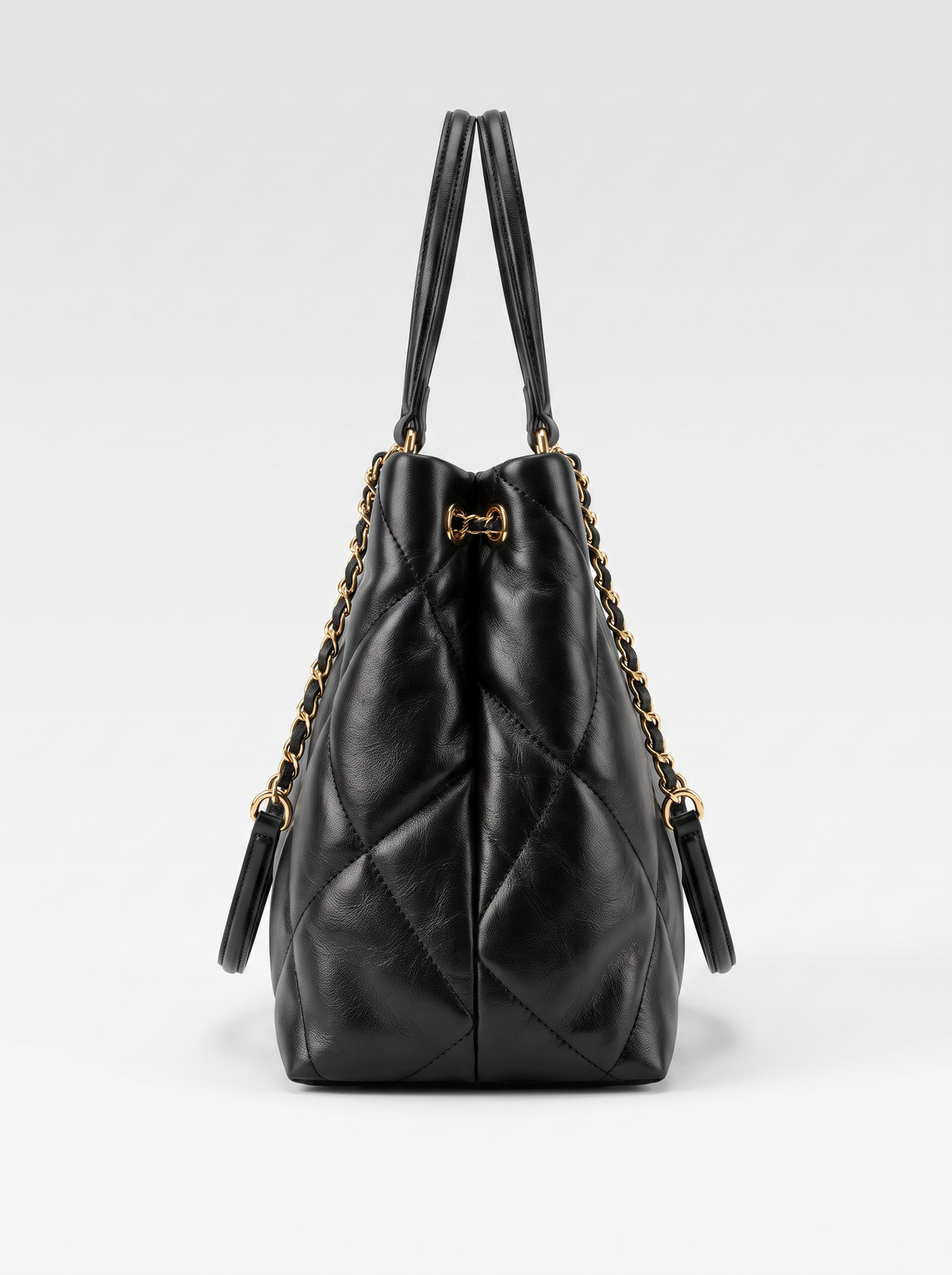 Leather tote bag with quilted stitching for women